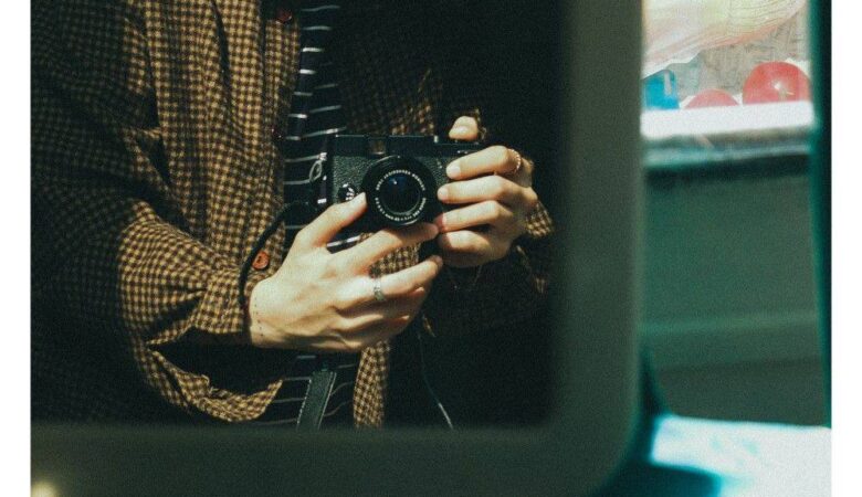 Why Do We Take Photographs?